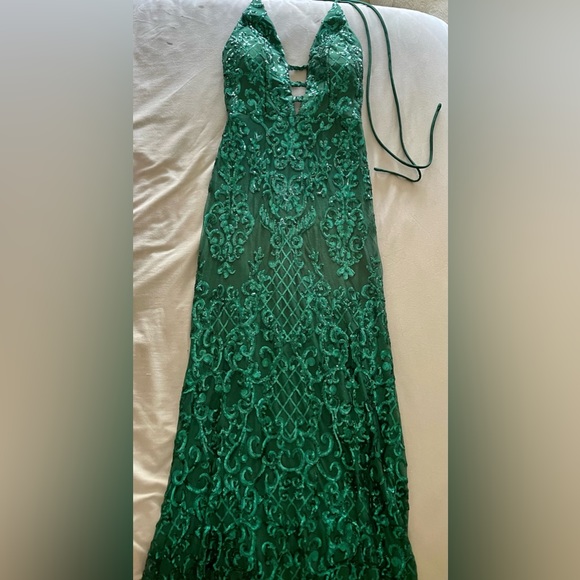 Dark green sequence prom gown. Form fitting and soft material on the inside. - Picture 2 of 3
